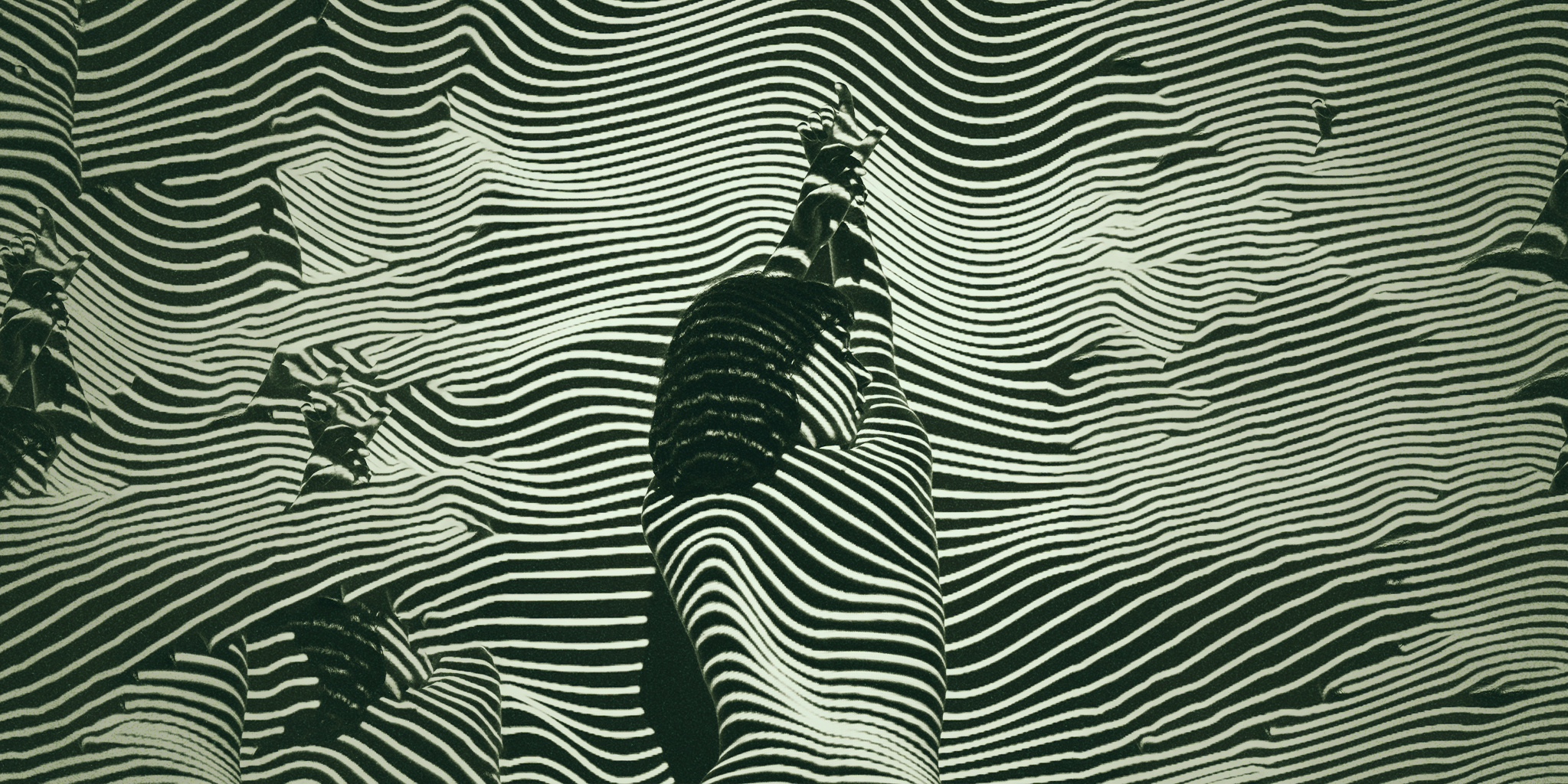 An abstract illustration representing the experience of OCD and PMDD, featuring a human figure partially concealed by wavy, overlapping black and white lines that create a sense of distortion and intensity.